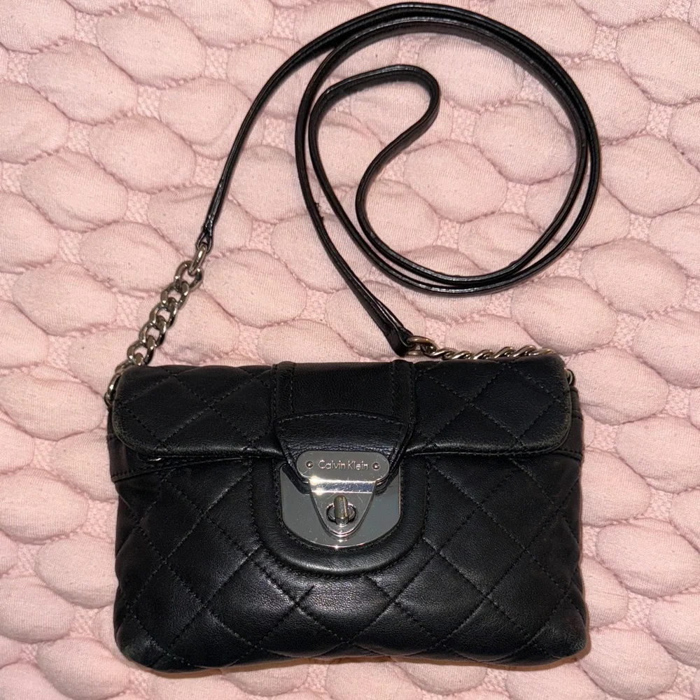 Calvin Klein Black Quilted Crossbody Bag with Silver Accents